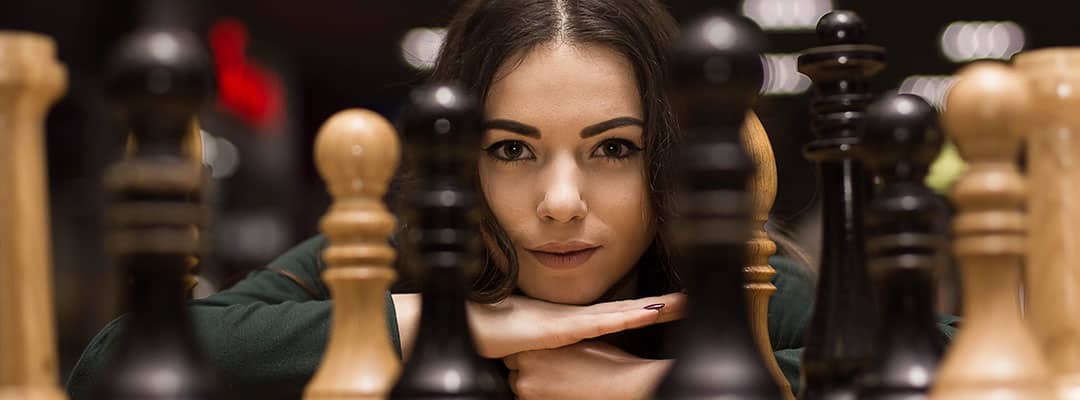 Woman playing chess