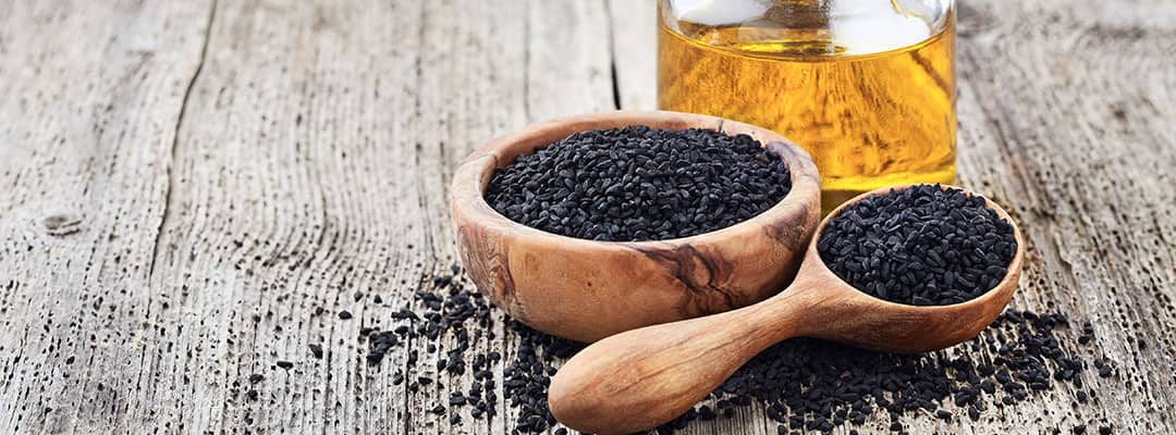 Beneficial to health black seed and black seed oil in a bottle