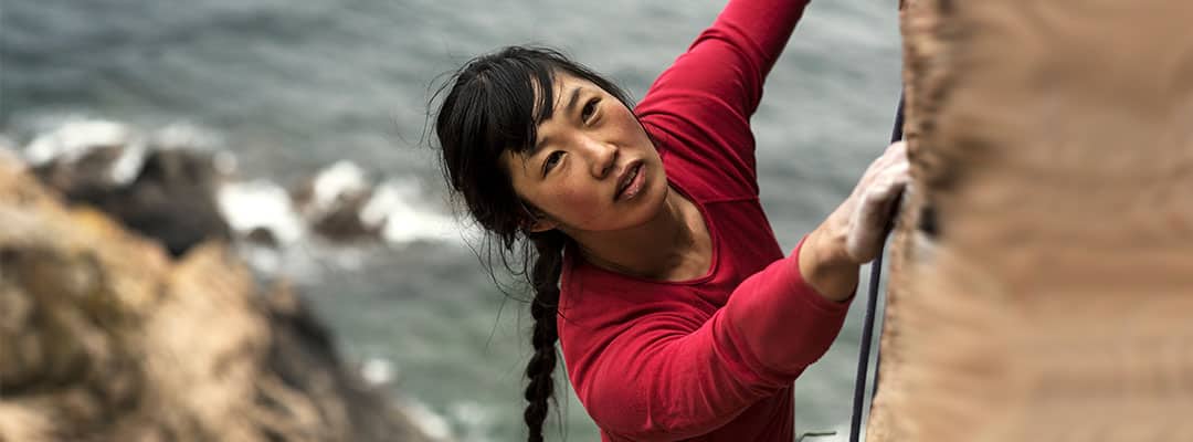 L-arginine helps woman stay strong while climbing a cliff